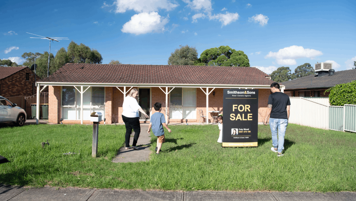 family checking out a property they want to buy