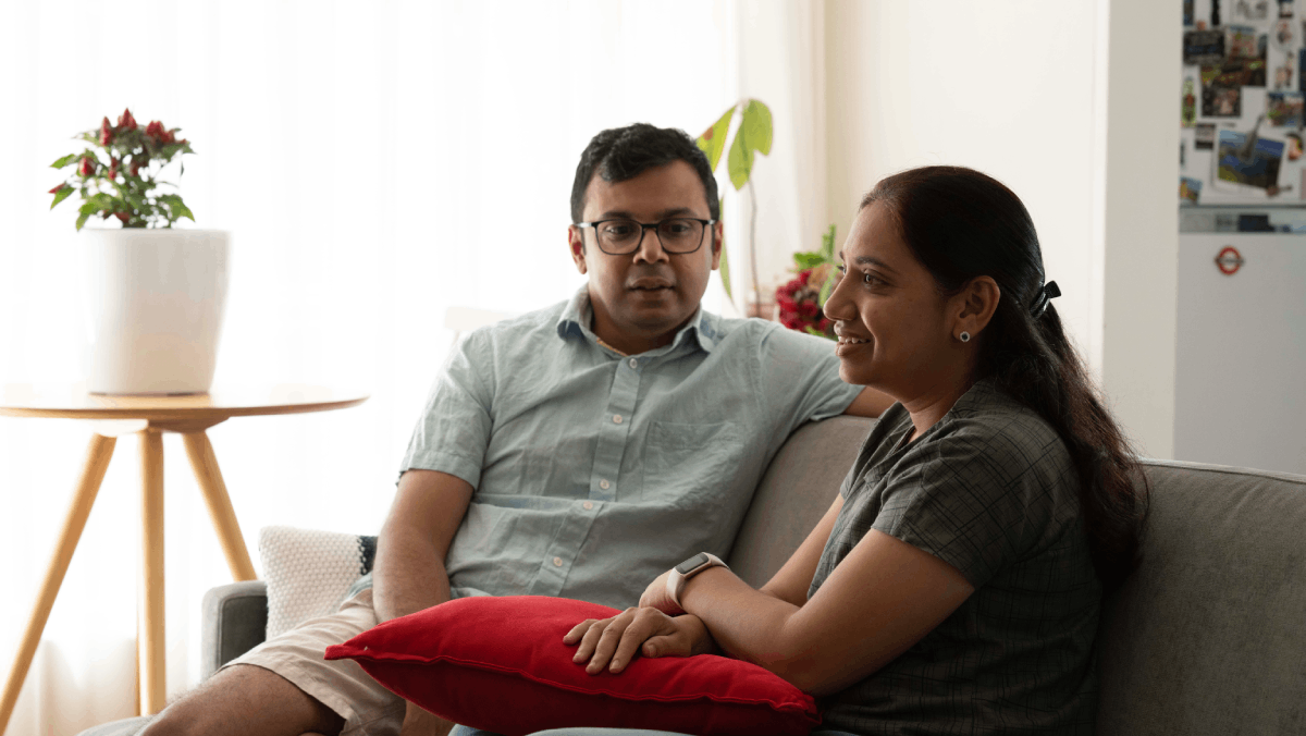 couple thinking of refinancing their home loan