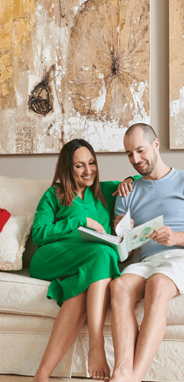 Couple sitting on their dream furniture piece