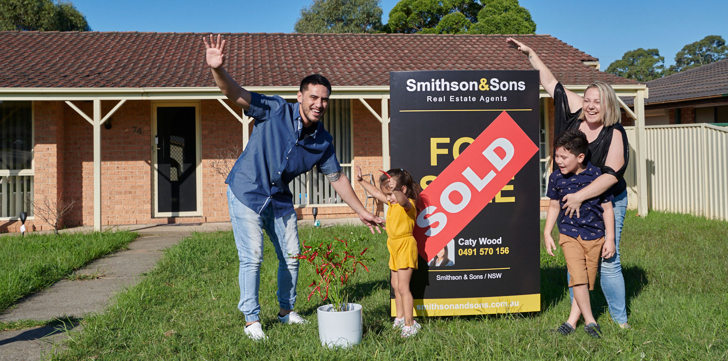 Family celebrating in their new home