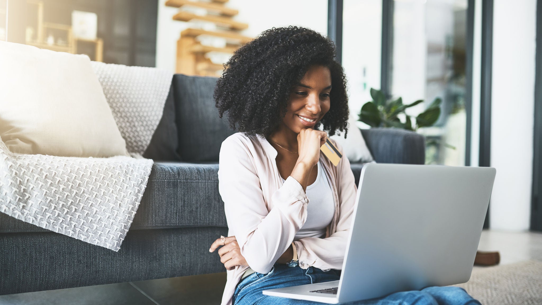 young woman avoiding credit card fraud online young woman avoiding credit card onlinefraud