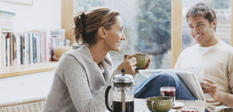 Couple having a conversation over coffee